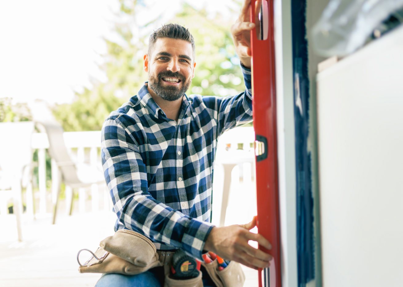 man installing window