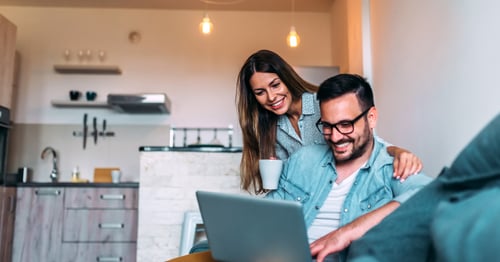 Couple conducting a home energy audit 